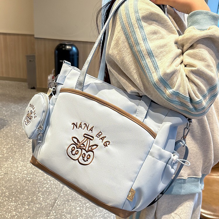High appearance level, trendy multi-functional bag, female student embroidered cartoon small schoolbag, versatile single-shoulder crossbody bag, book bag full figure