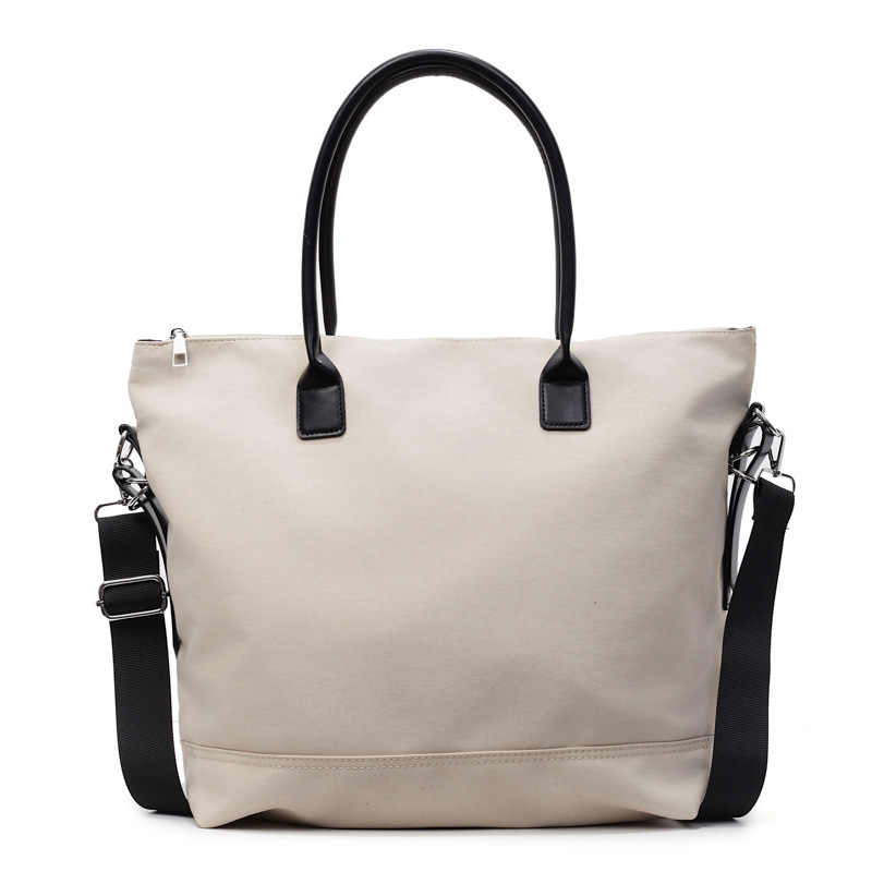 New large-capacity single-shoulder tote bag, lightweight nylon fabric crossbody handbag, solid-color style casual and laid-back women's bag Item Picture