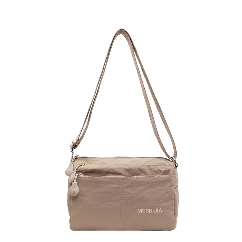 Cross-border crossbody bag, multi-compartment storage bag, ultra-light fabric bag, water-repellent walking bag, simple and casual small square bag for dampness Item Picture