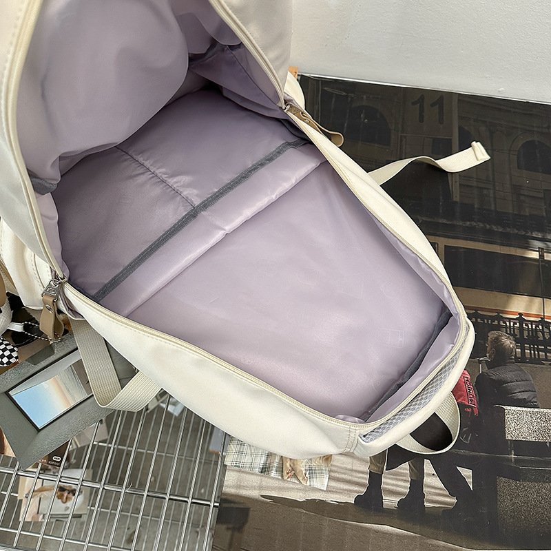 Japanese-style Instagram schoolbags, cool and trendy college couple simple backpacks, large-capacity letter casual backpacks for middle school students Application Scenario