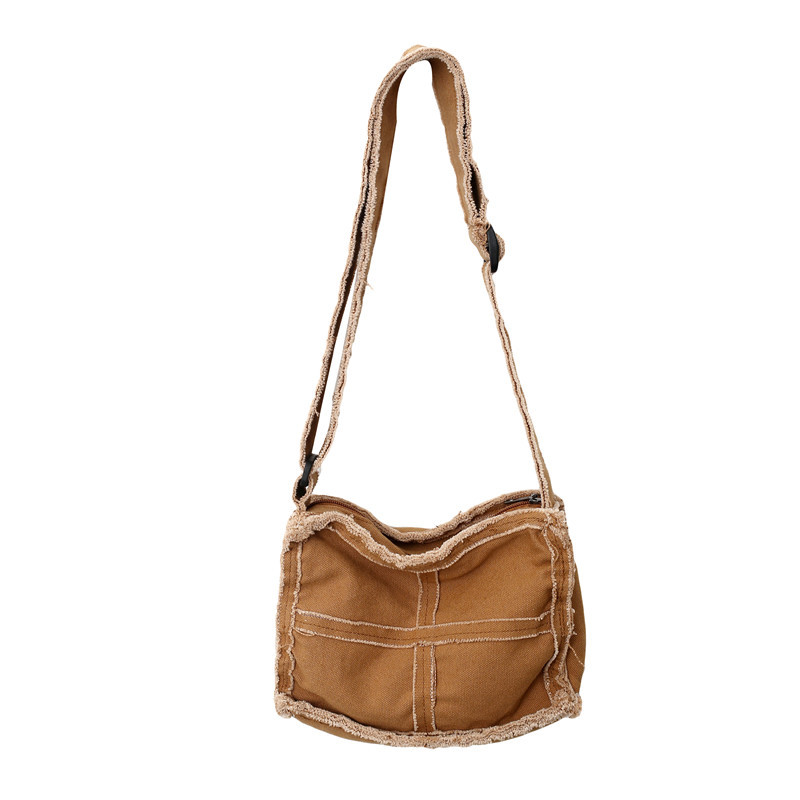 Japanese-style washed canvas bag for women, solid color, casual and niche single-shoulder crossbody bag, with unique fringed stitching and artistic mobile phone bag Item Picture