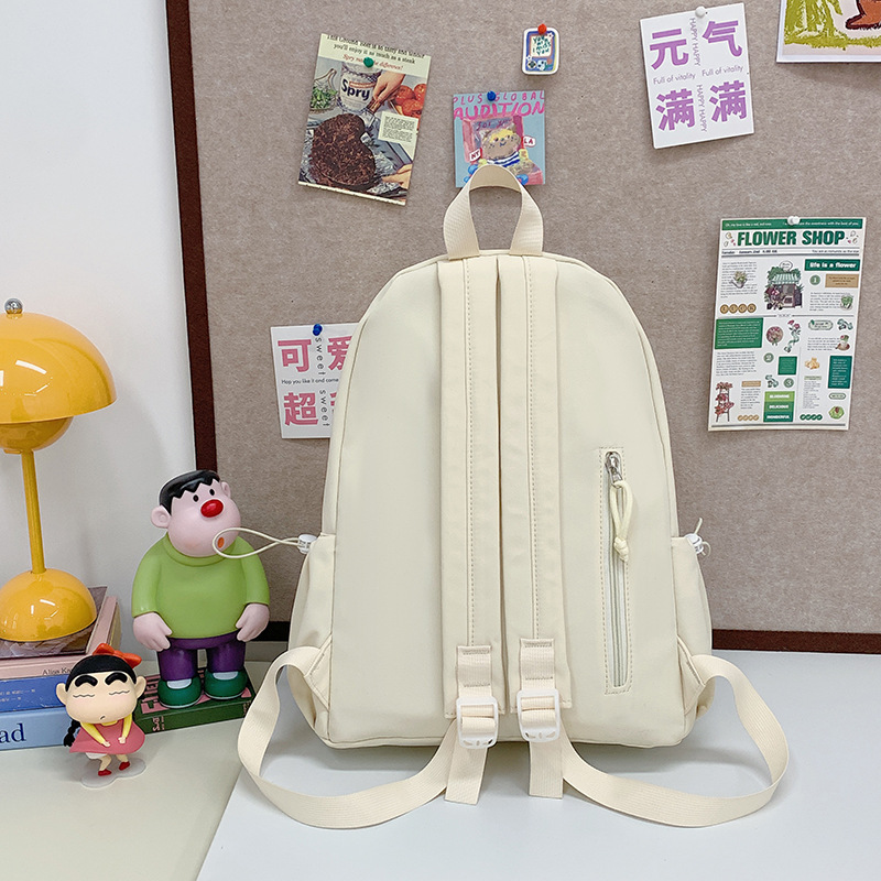 This is a new 2024 high school backpack for female college students with a high level of appearance, featuring a simple solid color and a fresh look Specification drawing