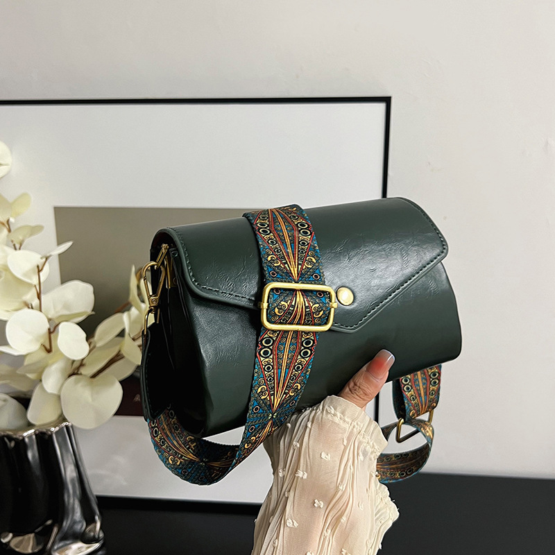 The 2024 new women's crossbody bag is a fashionable multi-layered cylindrical bag with a pu soft leather feel and a large capacity for casual single-shoulder use full figure