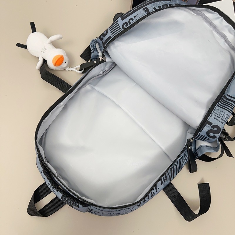 2024 New style schoolbag for boys, graffiti, cool, large capacity, high appearance level, backpack for girls, college students, couple backpack Application Scenario