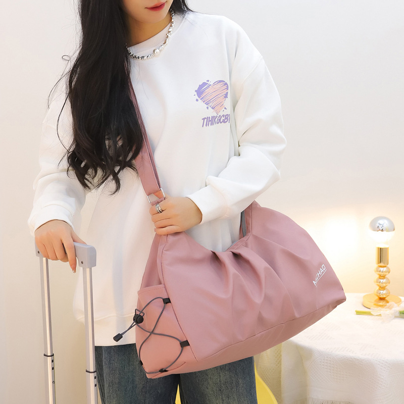 2025 New luggage bag, short-distance travel fitness bag, large-capacity sports, stylish waterproof backpack, men's and women's single-shoulder bag Application Scenario