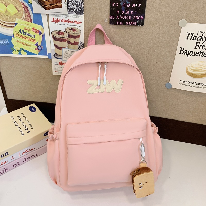 High-appearance-level schoolbags, lightweight and lightweight backpacks for primary school students, large-capacity backpacks for students in grades one, two and three for travel and study Tours full figure