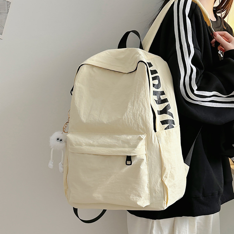 Japanese-style simple and versatile schoolbag for girls, high school and college students, backpack for junior high school girls, large-capacity travel lightweight backpack full figure