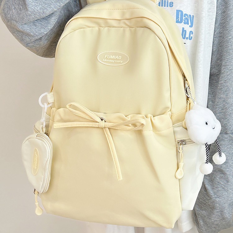 2024 New high-appearancelevel, fresh and simple solid color, versatile, high-capacity backpack for junior and senior high school students, female and college students Application Scenario