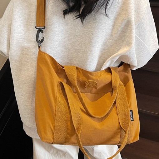 Large-capacity bag, versatile for women in spring and summer, 2025 new simple single-shoulder shopping bag, fabric bag, student tote bag for class details Picture