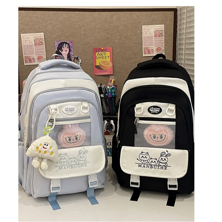 The new college-style transparent and fresh color-blocking schoolbag is a multi-layered lightweight backpack for primary and secondary school students, featuring cartoon classes Specification drawing