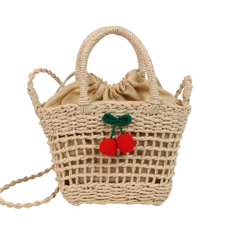 A new fashion single-shoulder crossbody bag for women in 2025, featuring straw and flower weaving. It is a French high-end hand-held bucket bag Item Picture