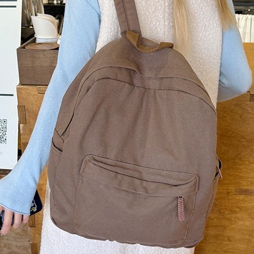 New Japanese-style solid-color fashionable backpacks, girls' schoolbags, girls' Korean-style high school lightweight backpacks, and girls' college students' backpacks Application Scenario