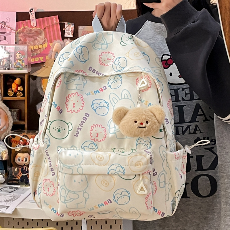 This is a new cartoon printed student backpack for the autumn and winter season of the foreign trade school. It has a large capacity and is cute and casual on campus full figure