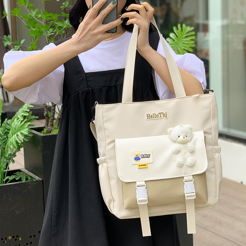 Large-capacity bag for girls, design sense, student class bag, casual and simple single-shoulder bag, color-blocking tutorial bag, tutorial bag for girls full figure