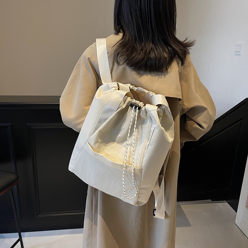 A new large-capacity, versatile Japanese solid-color, simple commuter backpack for women, multi-purpose drawstring handbag Specification drawing