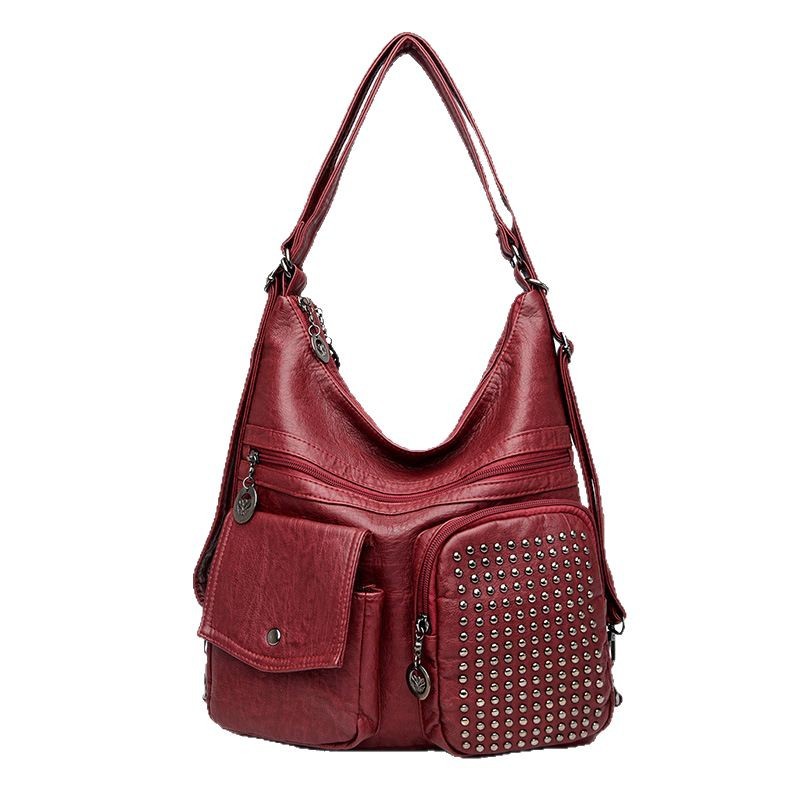 The new PU soft leather women's bag is versatile and fashionable. It's a multi-layered small bag with rivets and a casual single-shoulder crossbody bag Item Picture
