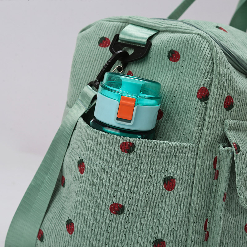 Strawberry travel bag, large-capacity corduroy luggage bag, women's lightweight hand-held crossbody bag, multi-functional sports and fitness bag Application Scenario