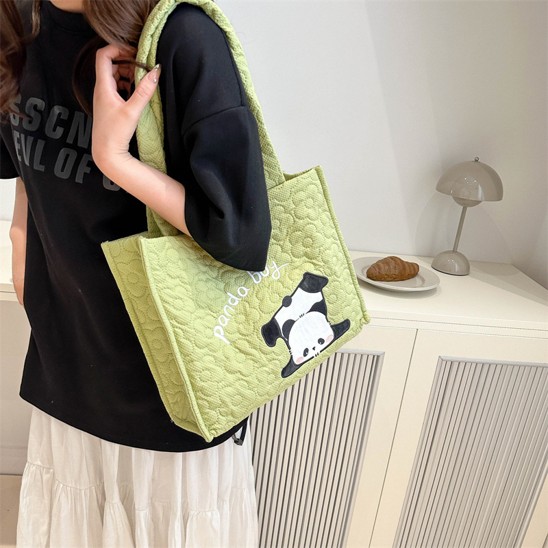 Wholesale of Katong's new panda Strawberry Bear handbag with large capacity magnetic clasp and cute single-shoulder tote bag storage bag Application Scenario