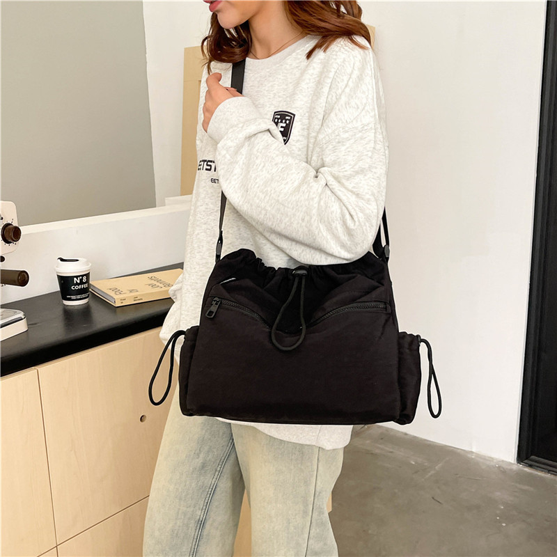 Japanese-style drawstring tote bag for girls, large capacity, niche design, versatile, single-shoulder crossbody bag for morning commuting at 8 a.m details Picture