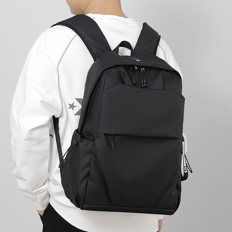 Wholesale of men's casual and trendy backpacks, computer bags, travel large-capacity backpacks, and school bags for junior high school, senior high school and college students details Picture