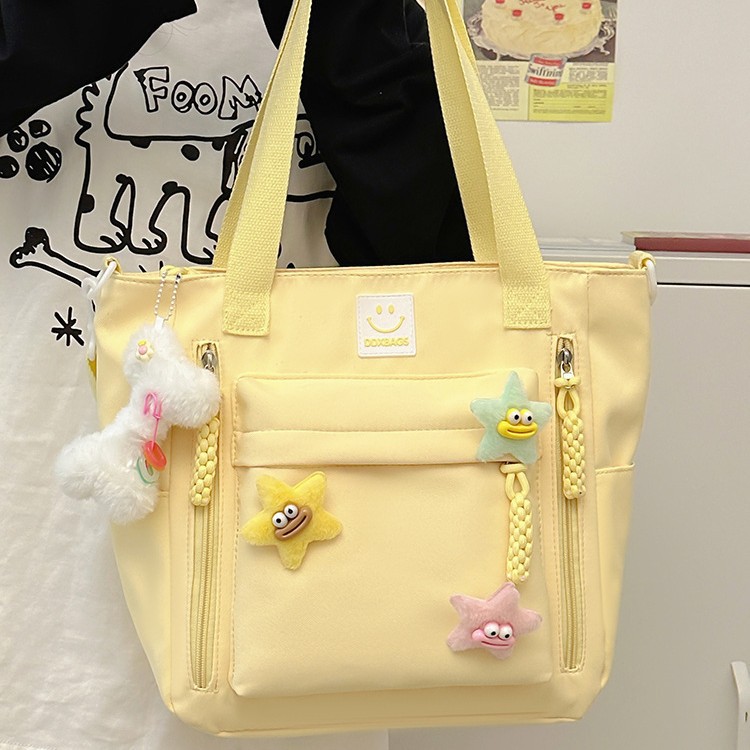 A versatile and casual fabric bag with a star-shaped design, lightweight and waterproof single-shoulder bag, and a crossbody bag for classes and shopping details Picture