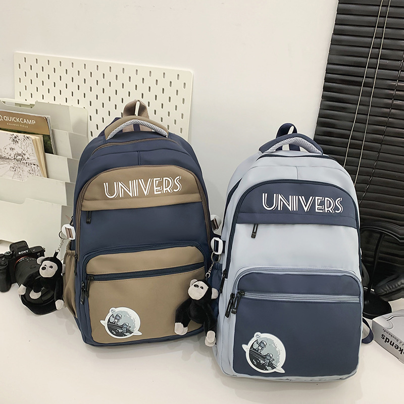 High-appearation-level retro workwear backpacks for girls, large-capacity high school and junior high school students, color-blocking schoolbags, trendy computer backpacks full figure