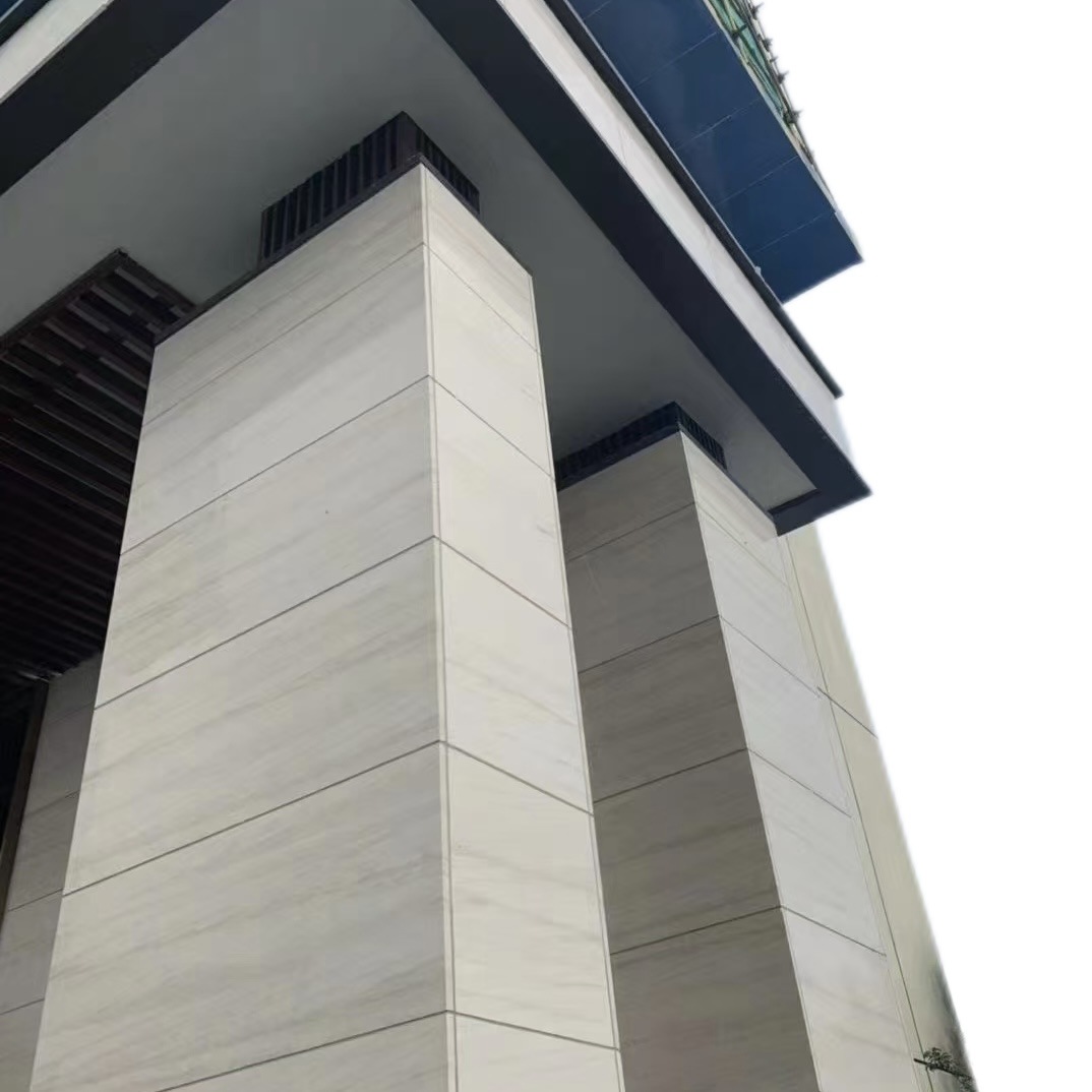 The exterior and interior walls of the natural lime stone marble villa project are made of French wood grain beige stone Item Picture