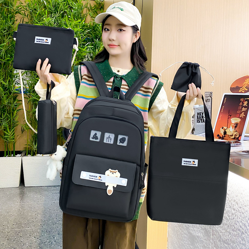 Cross-border spot wholesale of simple and versatile solid-color student schoolbags, large-capacity casual backpacks for women, five-piece sets of backpacks Application Scenario