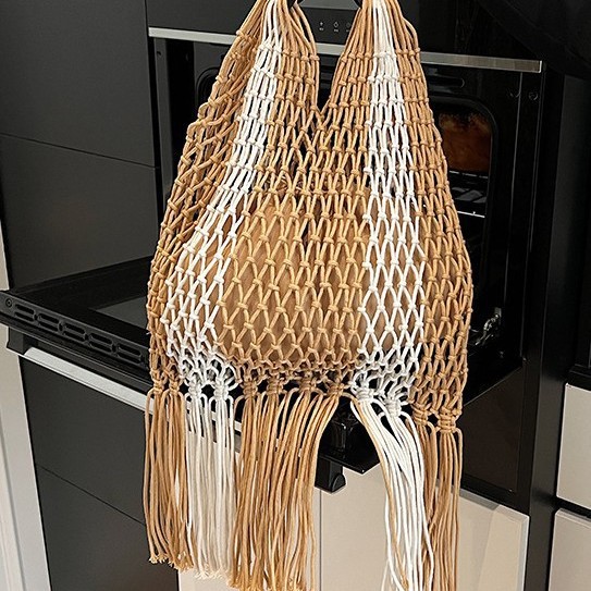 New straw woven bag, cotton rope handbag, cross-cut hollowed-out women's bag, beach bag, single-shoulder fashionable hollowed-out tassel underarm bag details Picture