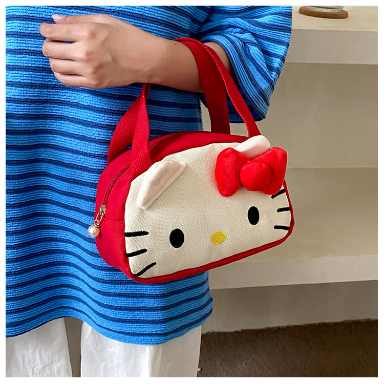 Melody KT Cat hand-held canvas large-capacity work handbag, cartoon cloth bag, fashionable embroidered handbag Application Scenario