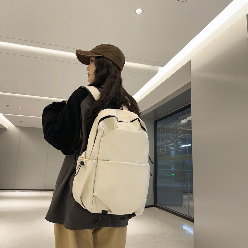 New student backpacks for men and women in simple solid colors, campus backpacks for high school and junior high school students, and casual travel bags details Picture