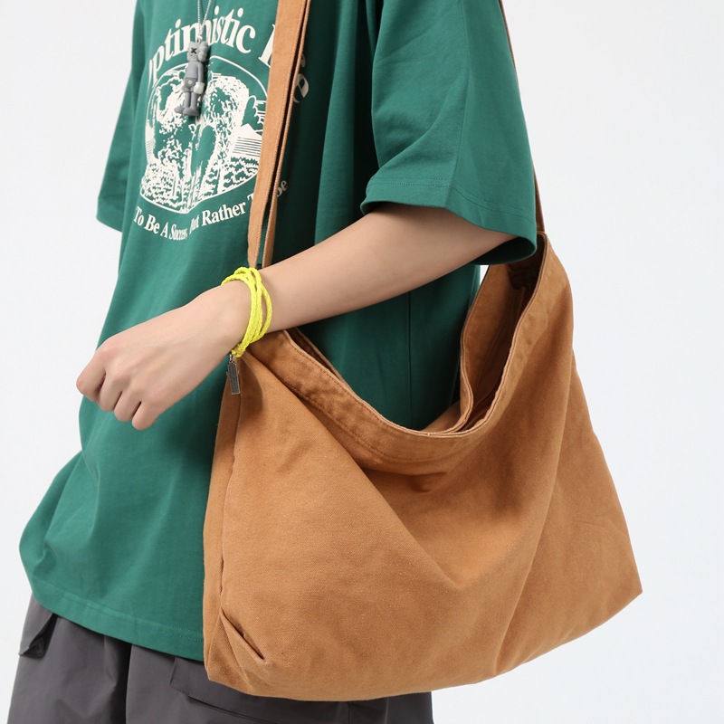 Order a new Japanese streetwear single-shoulder bag for women, a laid-back style solid color muji retro washed canvas bag details Picture