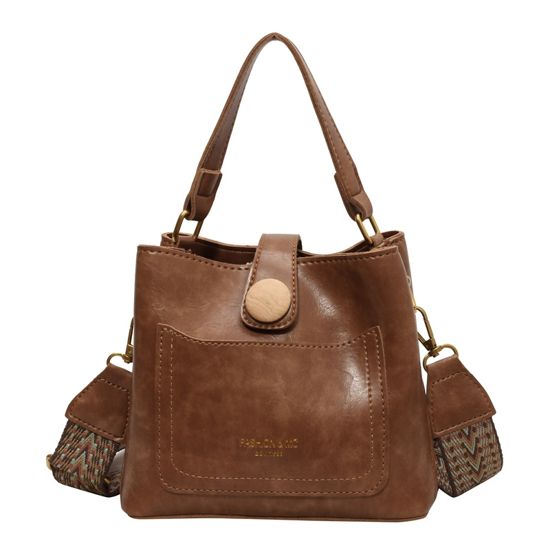 Bucket bag for women 2023 new style, solid color, high-end, retro, niche, wide-shoulder crossbody bag, hand-held small bag Item Picture