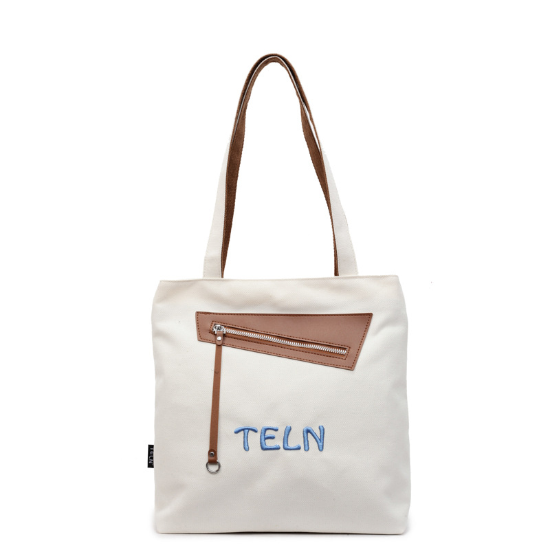 Color-blocking, fashionable, casual and versatile commuting canvas bag, large-capacity single-shoulder bag for women, hand-held special bag, and student book bag Item Picture