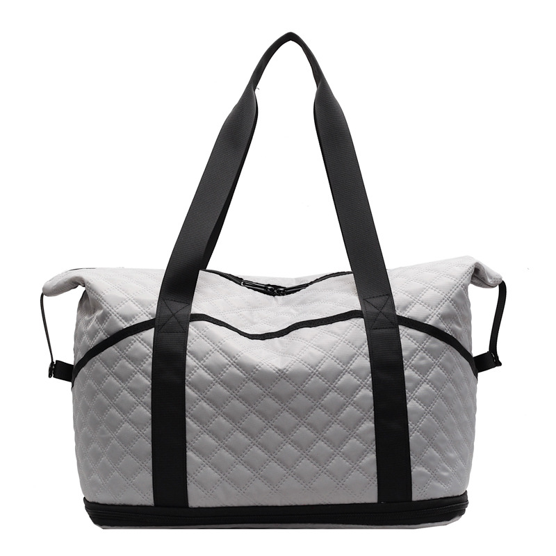 The new lightweight short-distance travel bag, the diamond-shaped hand-held dry and wet separation sports and fitness bag, and the expandable crossbody luggage bag Item Picture