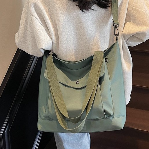 Hong Kong-style retro casual large-capacity tote bag for women 2025 new fashion trend hand-held cloth bag simple single-shoulder bag full figure