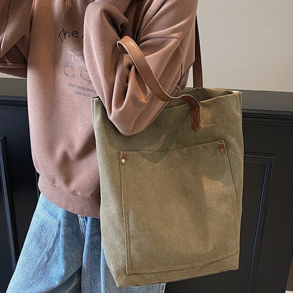 A large-capacity hand-held tote bag for men on the street in Harajuku, with a simple solid color and vintage feel, and a washable canvas single-shoulder bag for women details Picture