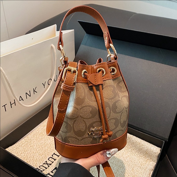 Retro niche design bag for ladies 2024 new high-end quality versatile crossbody bag, floral hand-held bucket bag full figure