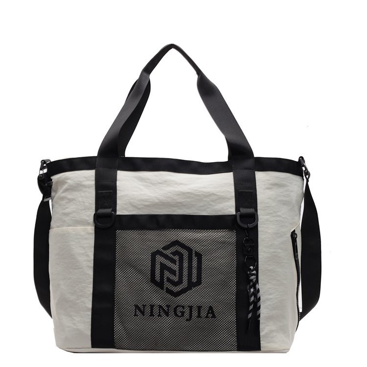 Trendy casual sports fitness bags for men and women, fashionable short-distance crossbody travel bags, lightweight hand-held yoga swimming bags Item Picture