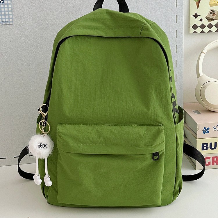 A cute student macaron letter backpack for casual students on Instagram. It's a simple, trendy and fresh backpack Application Scenario