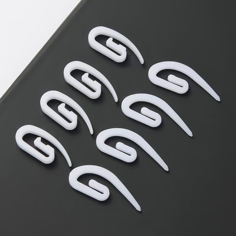 The manufacturer wholesals curtain hooks, small pointed hooks, curtain fabric tape hooks, white plastic hooks and curtain ring accessories Application Scenario