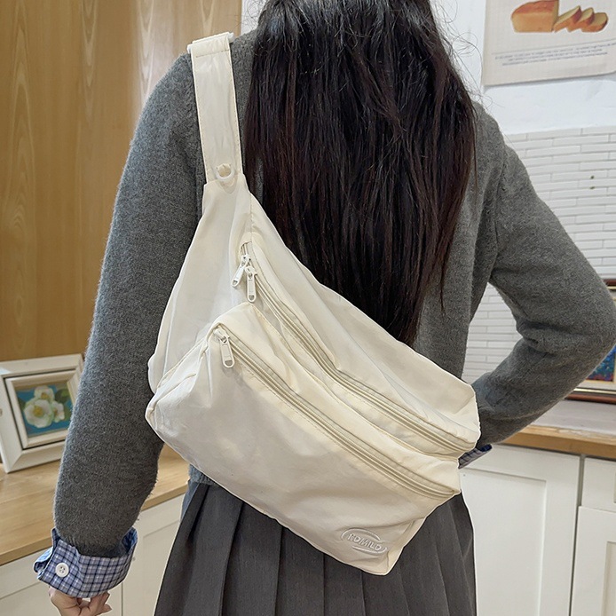 Korean-style fashionable crossbody bag, women's lightweight cycling backpack, niche design, InS-style commuting casual solid color single-shoulder bag full figure