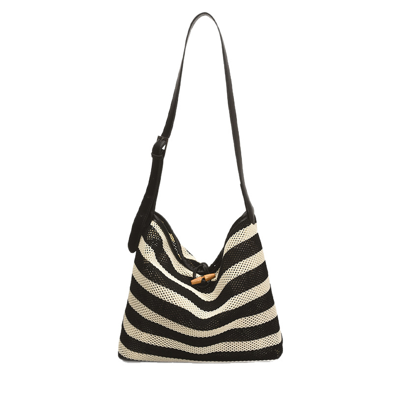 A new 2025 summer collection of simple and casual woven bags for women's beach play and vacation, a laid-back striped single-shoulder crossbody bag Item Picture