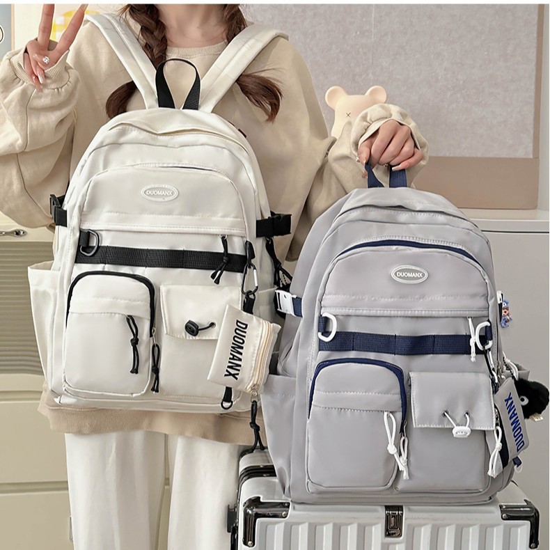 Japanese-style simple solid-color casual backpack, high appearance level, junior high school student schoolbag, large capacity, versatile, workwear-style backpack Specification drawing