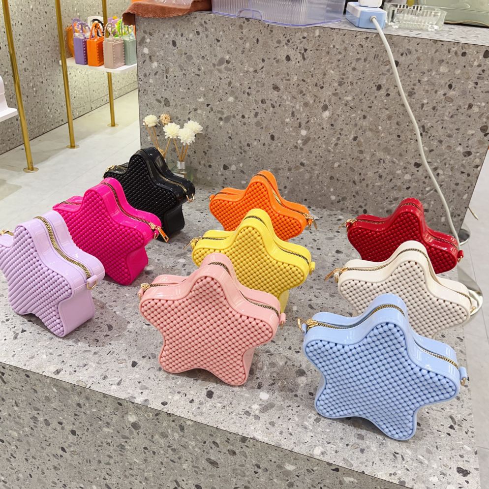 2025 New Star Bag, cute children's bag, cartoon pearl bag, fashionable chain bag, and Girls' hollowed-out single-shoulder bag details Picture