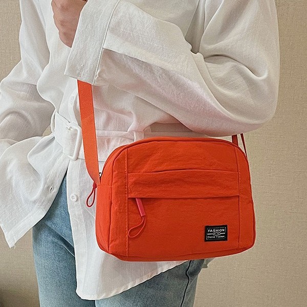 A versatile nylon fabric bag for cross-border use between Japan and South Korea, a solid color multi-functional single-shoulder bag for commuting and work, a cosmetic bag, and a crossbody bag full figure
