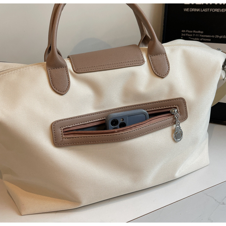 Large-capacity short travel bag for women, simple and fashionable letter handbag, women's luggage bag for going out, waterproof fitness bag Specification drawing