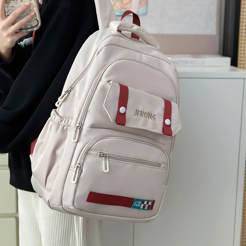 American-style versatile high-capacity schoolbag for junior high school students, color-blocking backpack for girls and middle school students, and Instagram casual computer backpack full figure