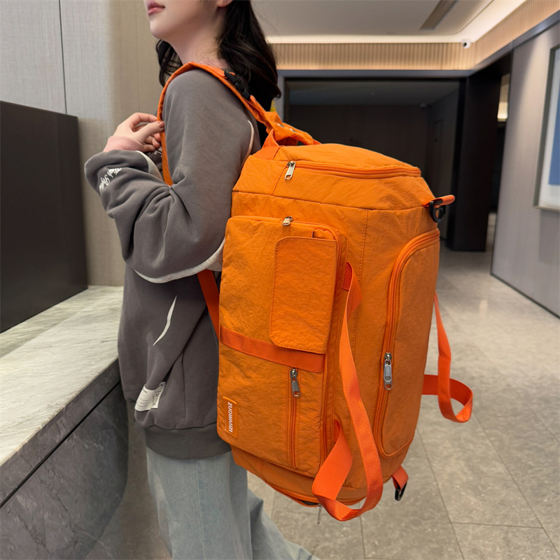 Foldable dry-wet separated travel bag, large-capacity swimming and fitness bag with shoe compartment, lightweight short-distance double-back luggage bag Application Scenario