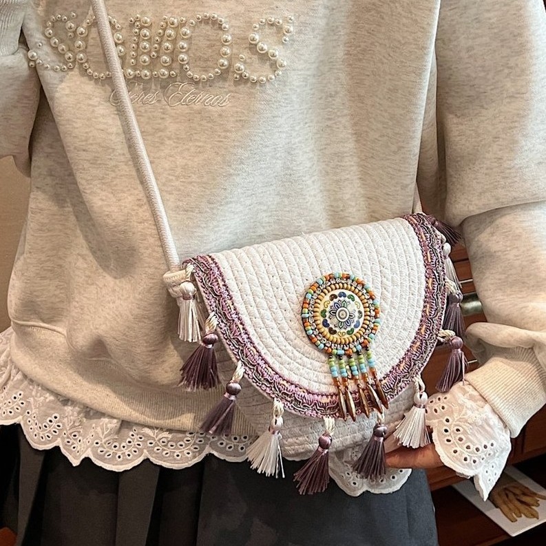 Casual woven bag 2025 Spring New Style straw woven bag, ethnic style niche tassel handbag, texture envelope bag full figure